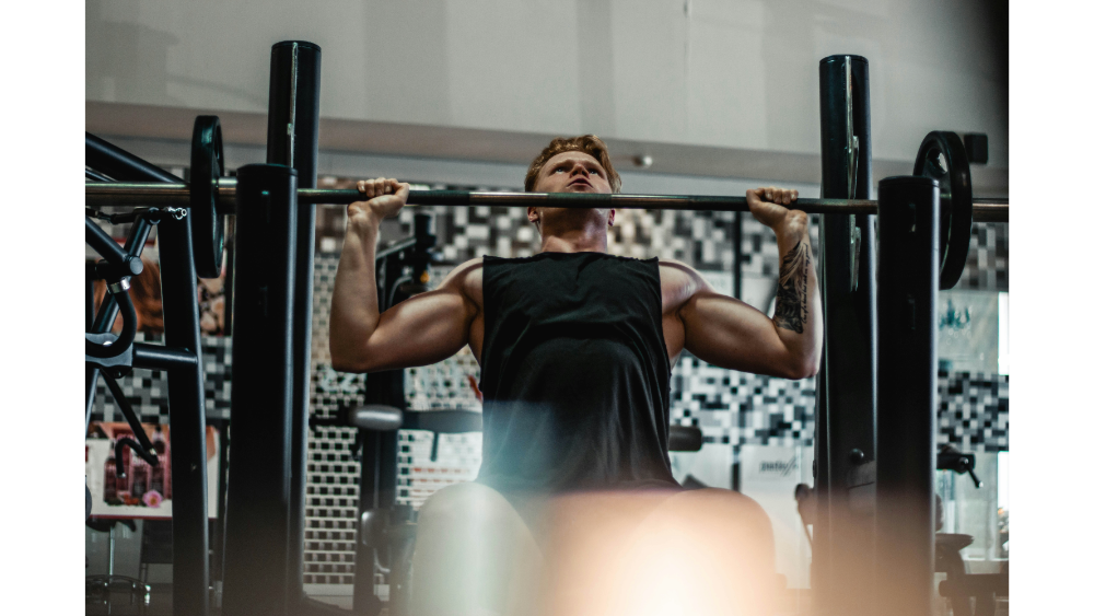 A man doing a shoulder press