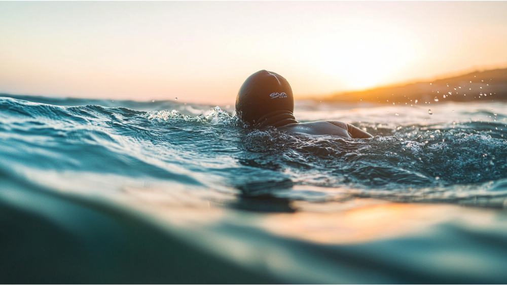 A man swimming for a triathlon