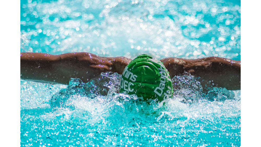 A man swimming butterfly