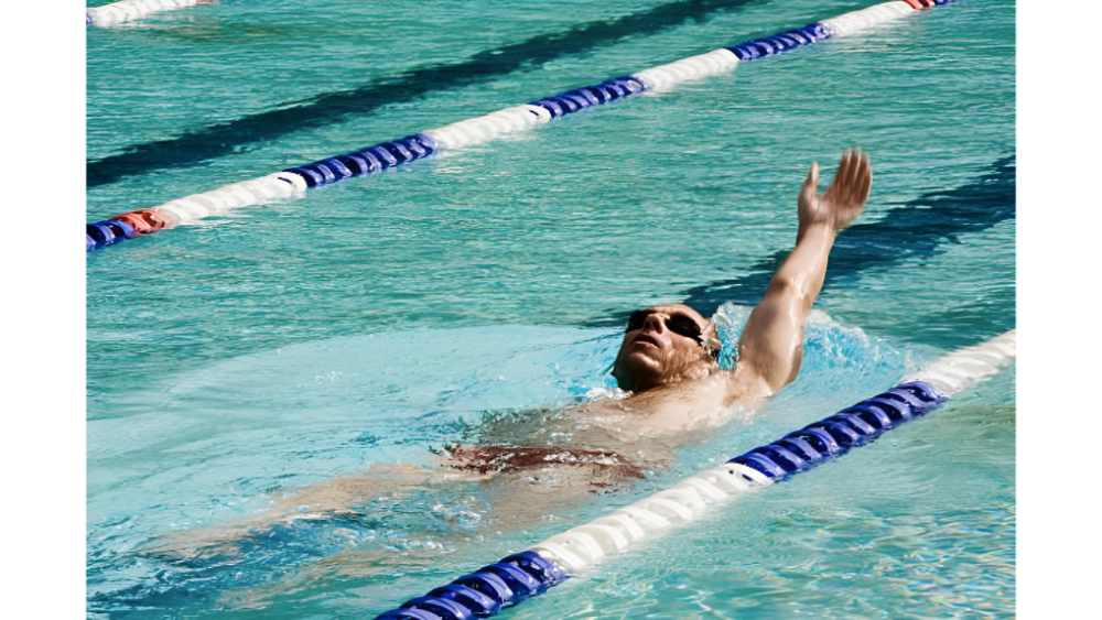 A man swimming backstroke