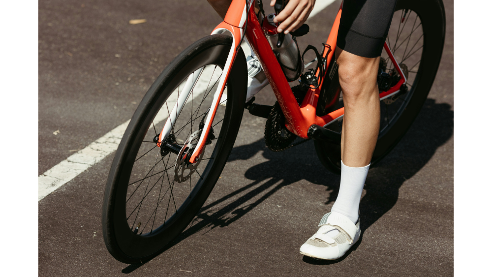 A man riding his bike